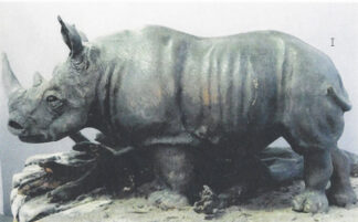 Basswood Rough-out Rhinoceros <P>3 1⁄2" W x 5 1⁄2" T x 10" L by Jim Wilsford